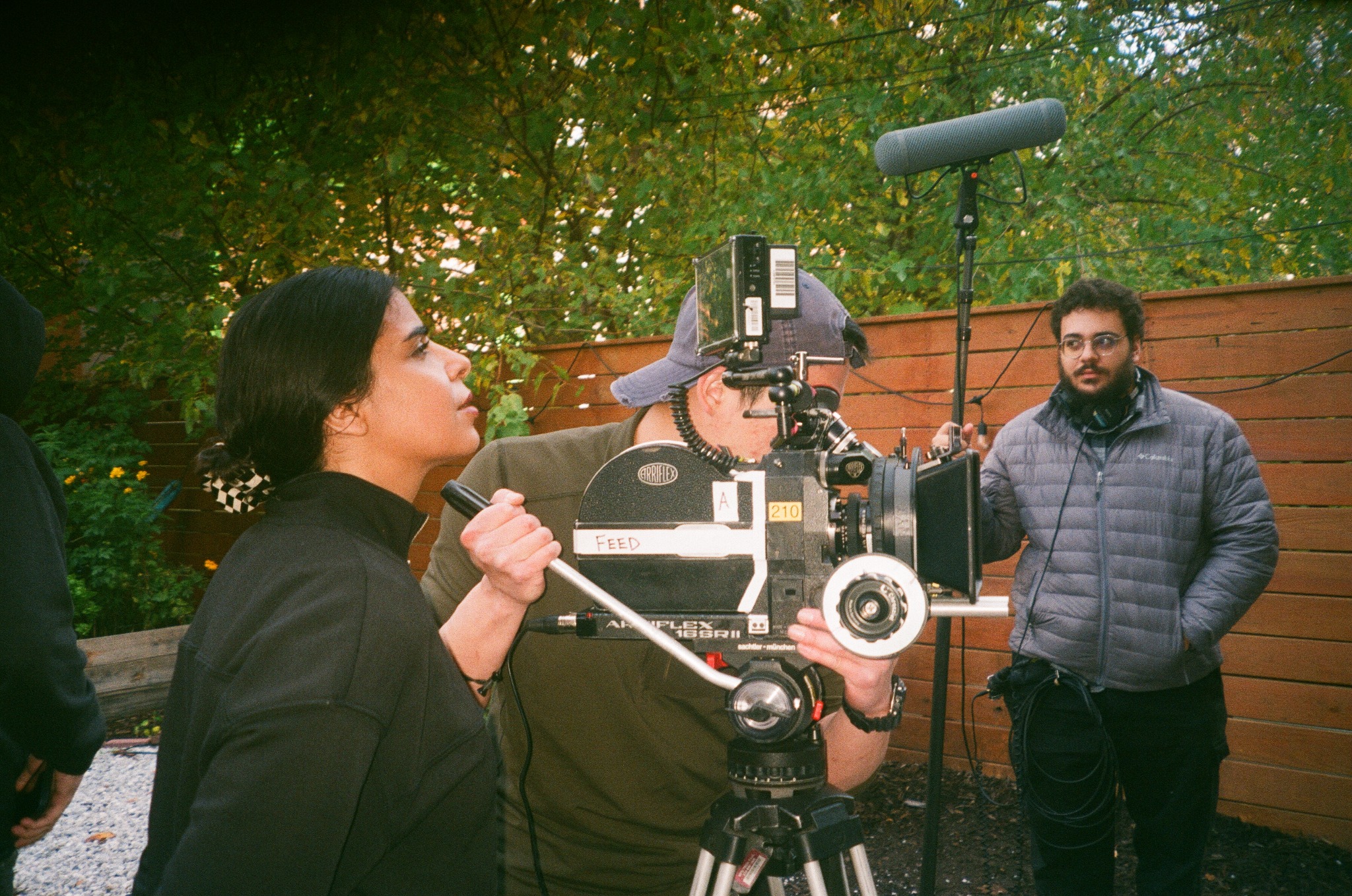 Maïssa Lihedheb directing on set beside a 16mm film camera